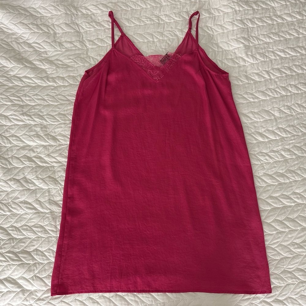 Pink silk mini dress with adjustable straps and lace detail in size XS